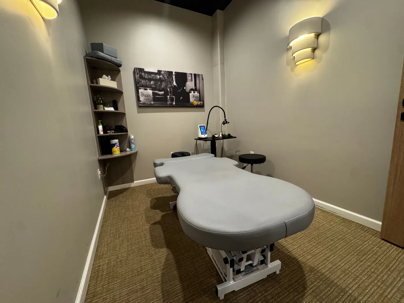 Laser, massage, and stretch therapy room at 100% Chiropractic Austin Rosedale.