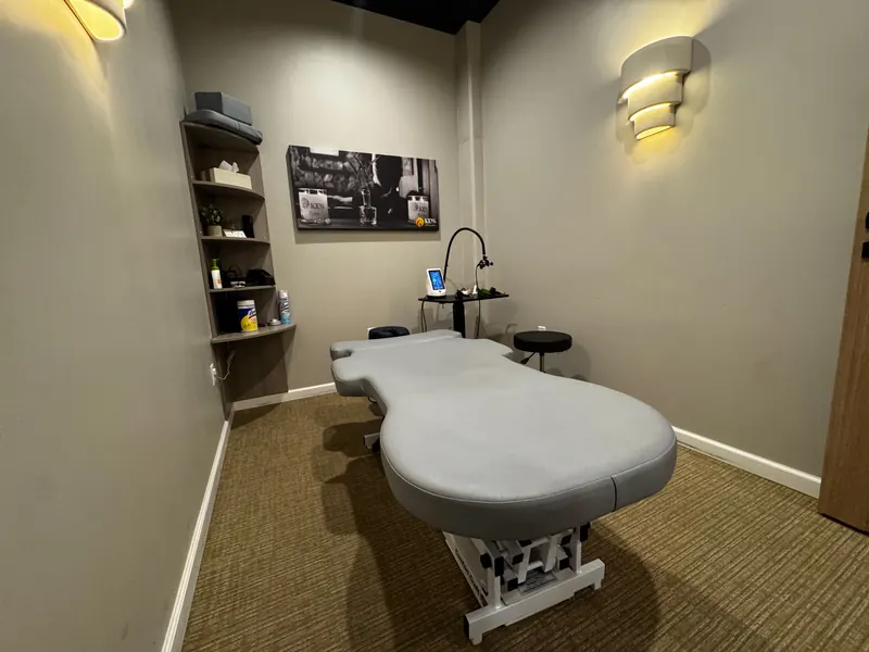 Massage, stretch therapy, and laser therapy room at 100% Chiropractic Austin Rosedale